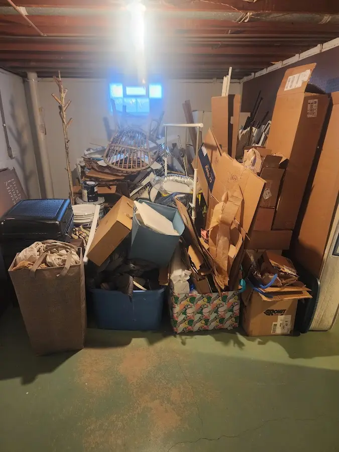 Roll-off dumpster container at job site for 20 Yard Dumpster Rental in East Allen